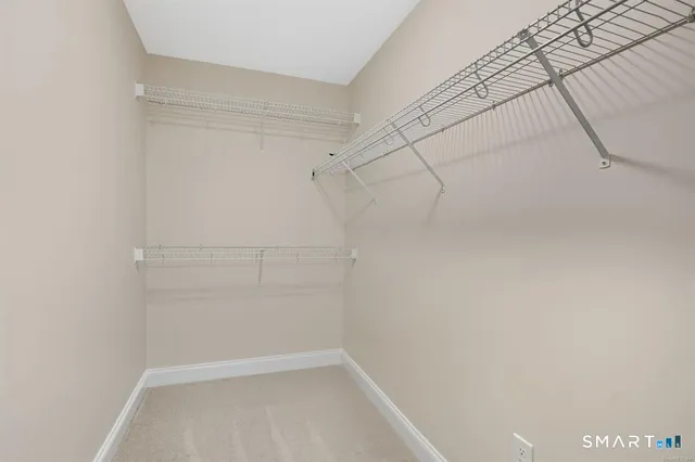 a view of a room with racks on the wall