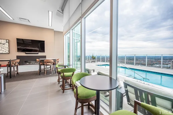 a view of a livingroom with furniture window and outside view