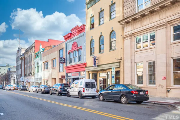 a cars parked in front of a building