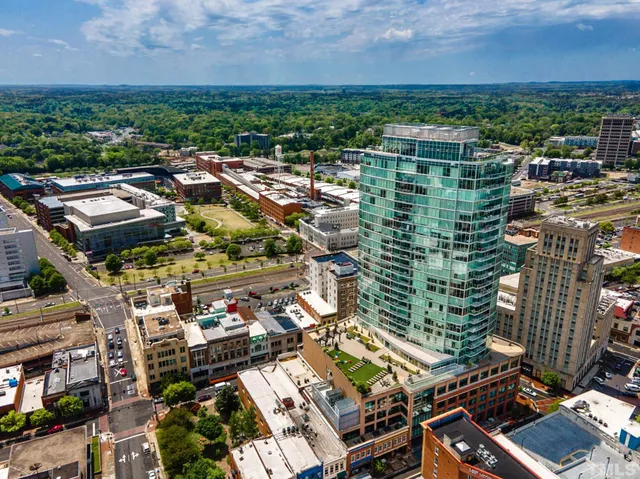an aerial view of residential building and lake view