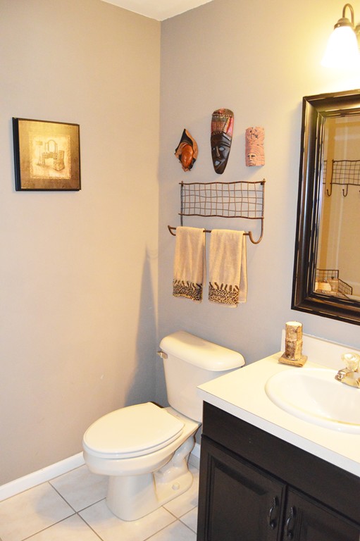 19 Birch Road Cumberland, RI 02864 - Photo 11 of 24 a bathroom with a toilet a sink and mirror