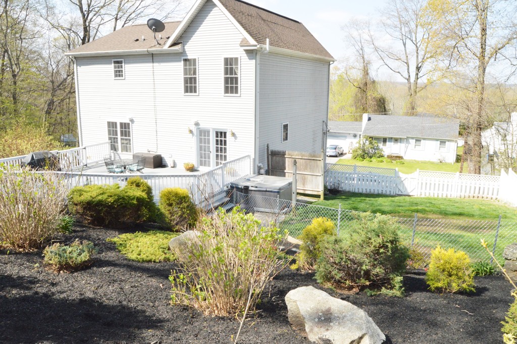 19 Birch Road Cumberland, RI 02864 - Photo 23 of 24 a view of a house with backyard and sitting area