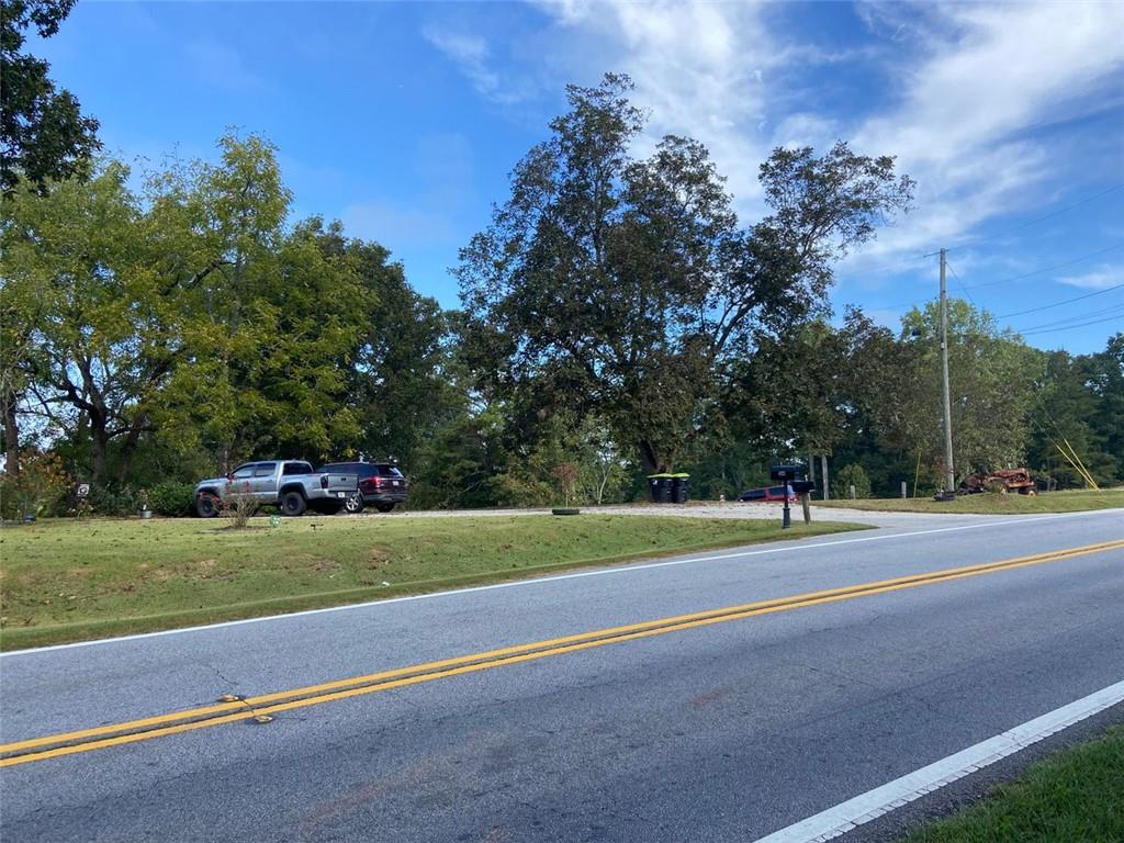 4625 Post Road Winston, GA 30187 - Photo 3 of 5 a view of a tennis ground with large trees