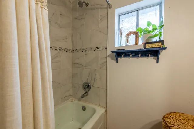 a very nice looking room with many windows