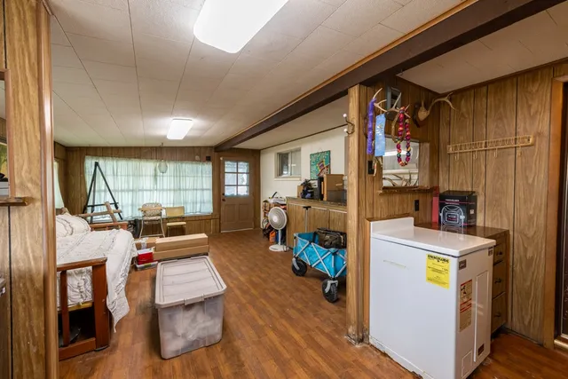 a view of a house with backyard porch and patio