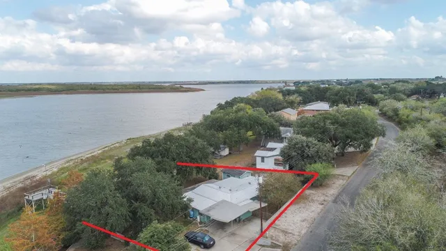 a balcony with furniture and wooden floor