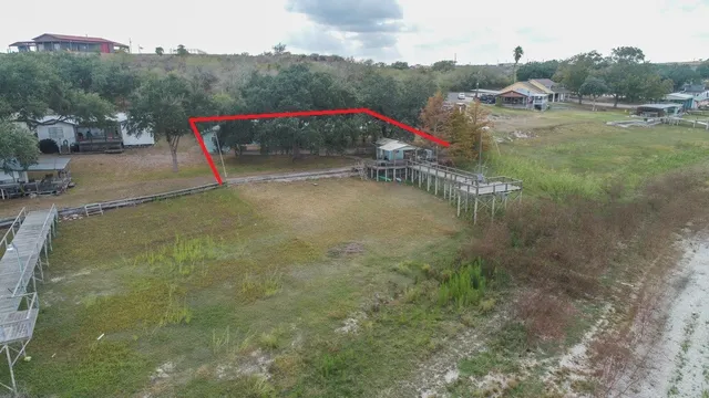 a view of a park with large trees