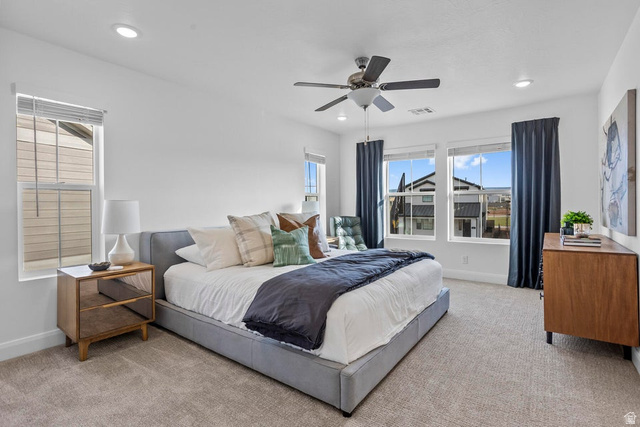 488 West Greenstone Pl Street, Unit 1010 St. George, UT 84790 - Photo 21 of 34 Carpeted room featuring a ceiling fan, recessed lighting, and multiple windows with blinds and dark curtains