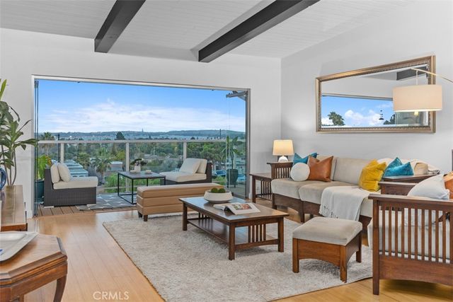 a outdoor living space with furniture and a potted plant