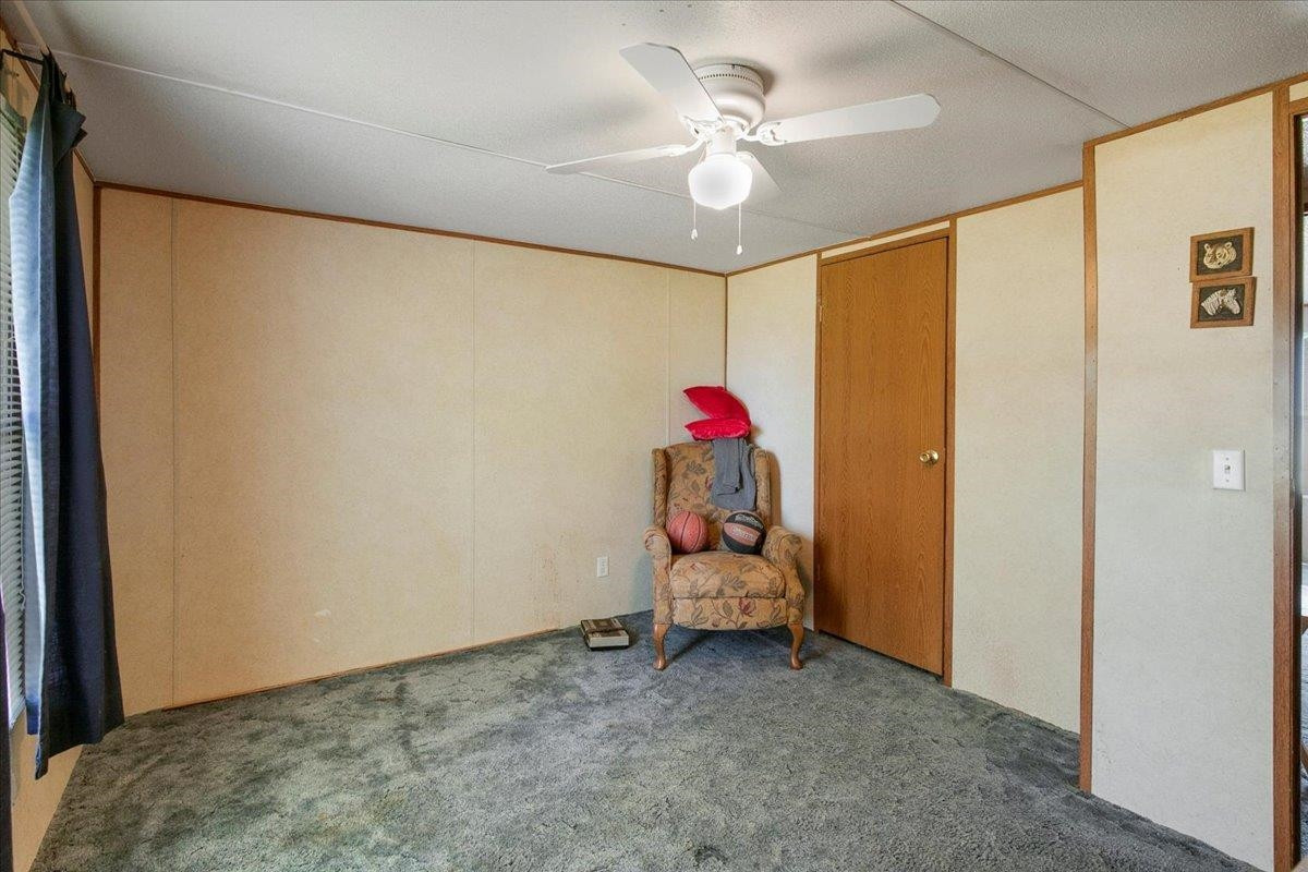 2014 Chad Place Angier, NC 27501 - Photo 25 of 47 a view of a room with furniture and a fan