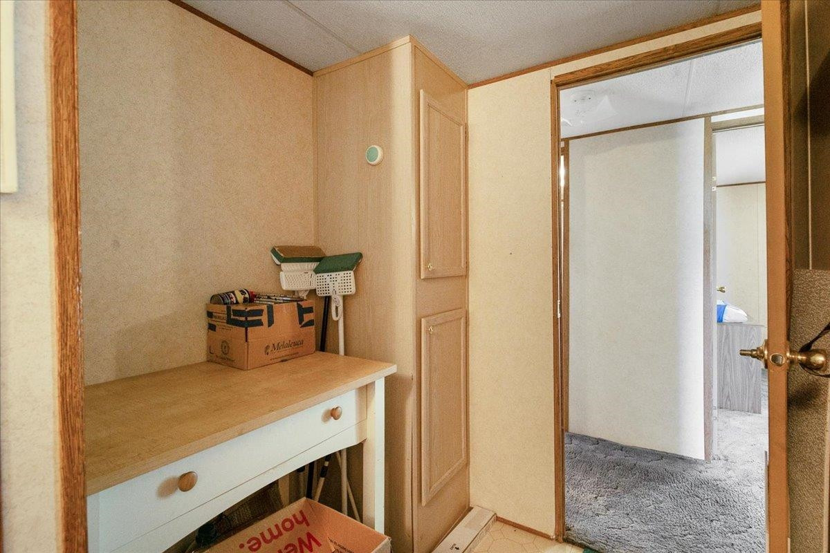 2014 Chad Place Angier, NC 27501 - Photo 31 of 47 a room with a bed and a table in it