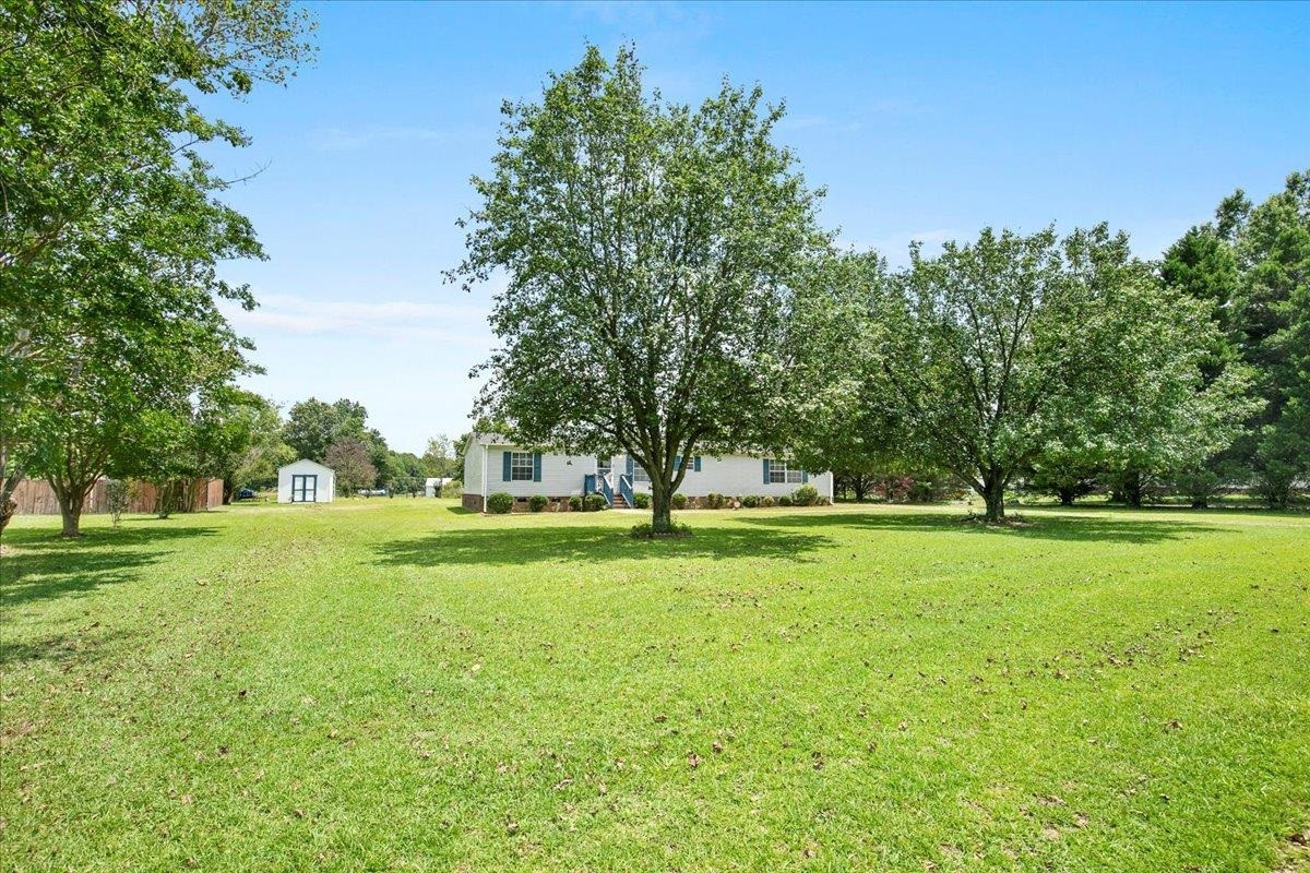 2014 Chad Place Angier, NC 27501 - Photo 42 of 47 a view of field with trees in the background