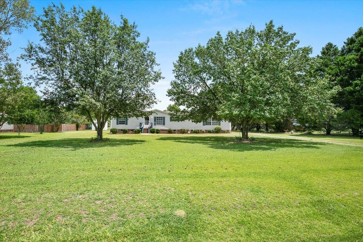 2014 Chad Place Angier, NC 27501 - Photo 43 of 47 a view of a house with a yard