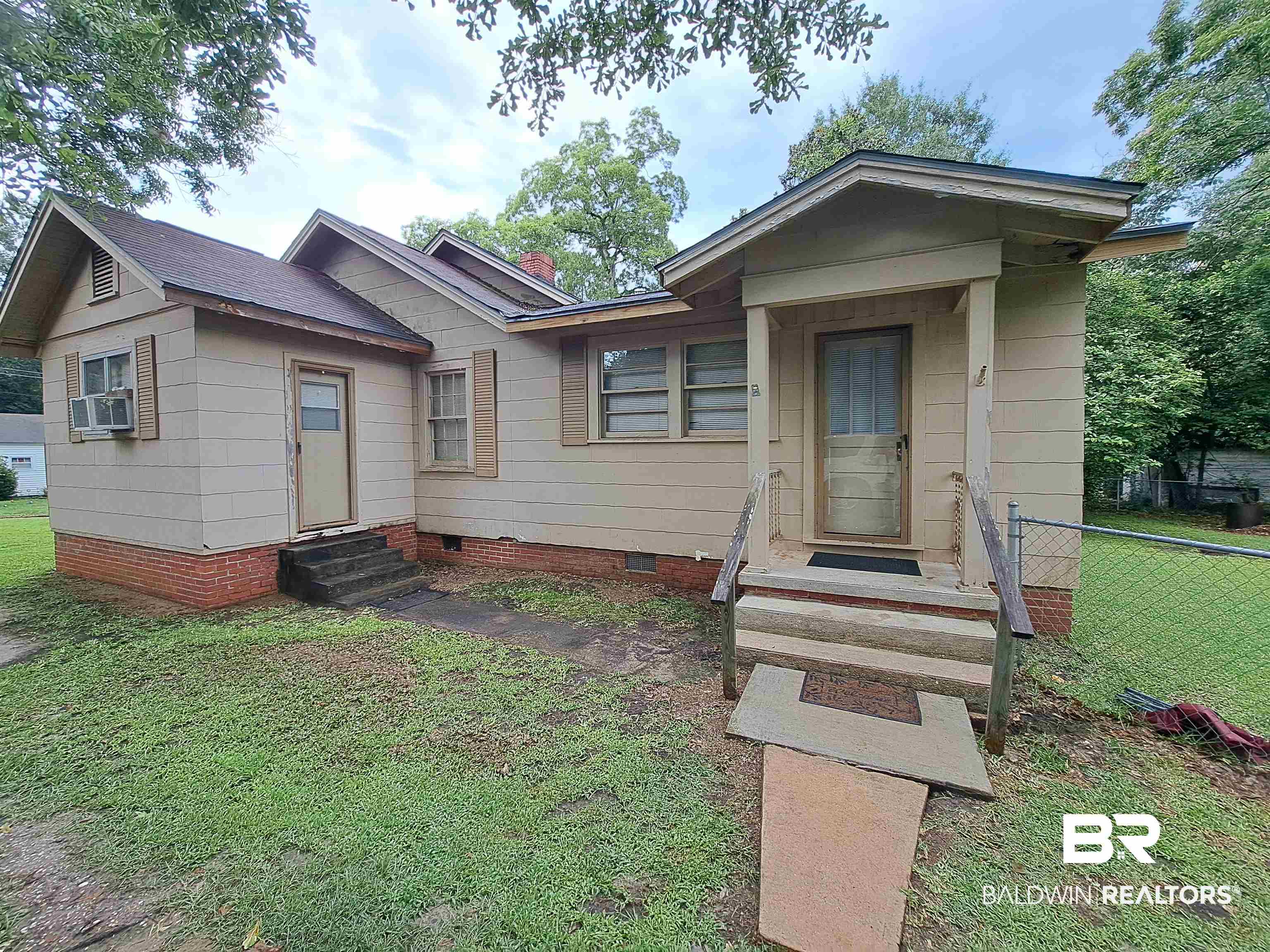 309 Bellview Avenue Evergreen, AL 36401 - Photo 2 of 27 View of front of home featuring entry steps and crawl space