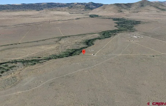a view of beach and mountain