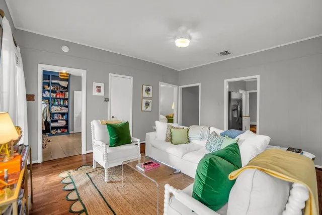 a living room with furniture and a couch