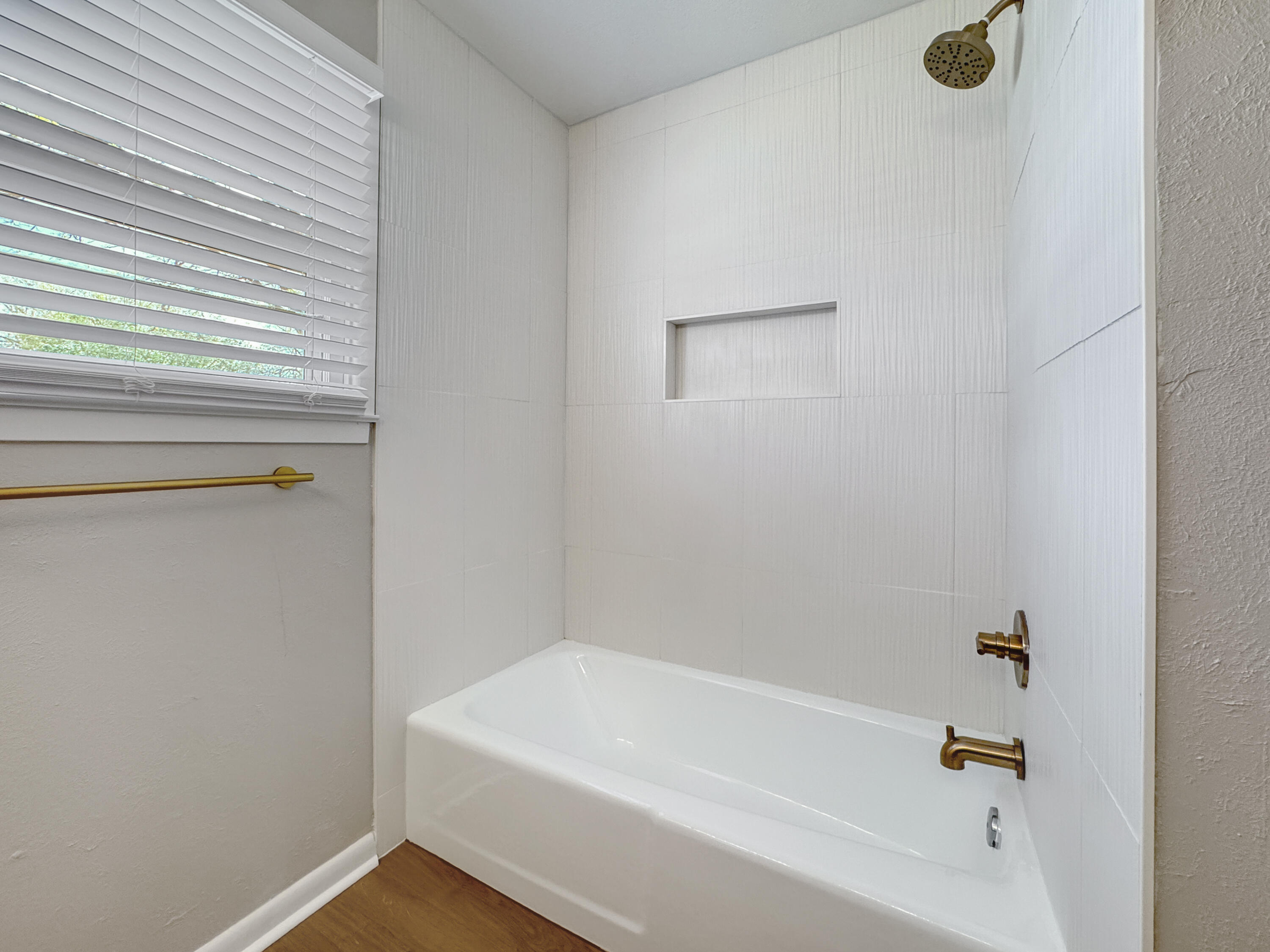 5502 8th Street Lubbock, TX 79416 - Photo 38 of 41 a bathroom with a bathtub