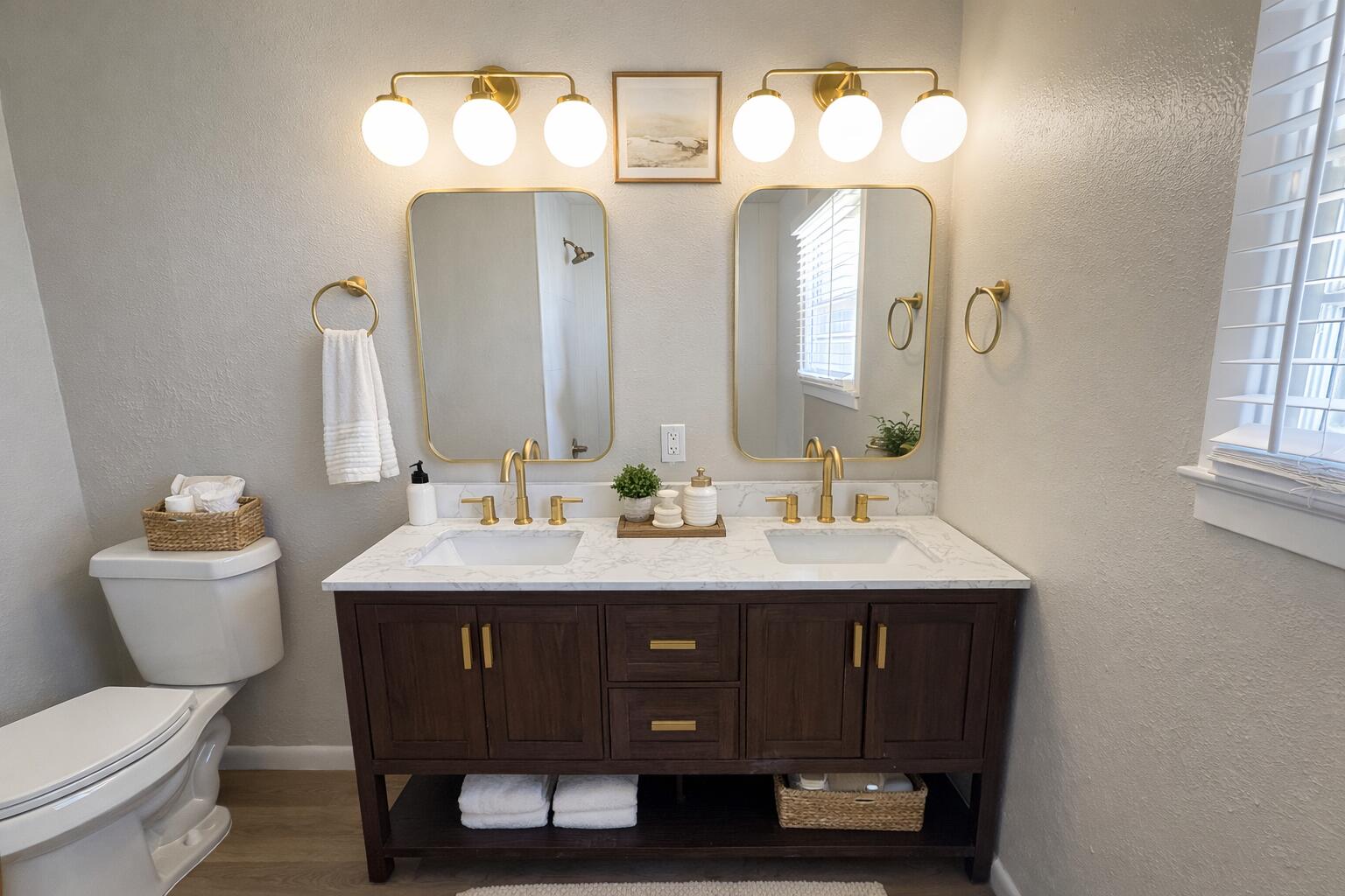 5502 8th Street Lubbock, TX 79416 - Photo 7 of 41 a bathroom with a toilet a sink and a mirror