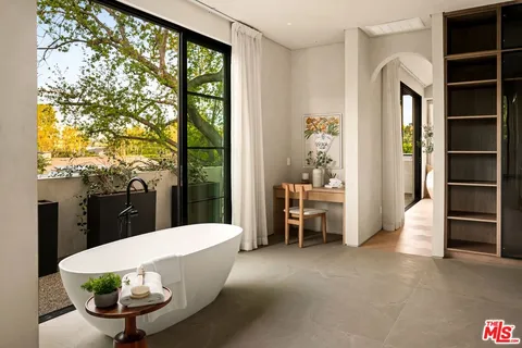 a view of a living room and a window