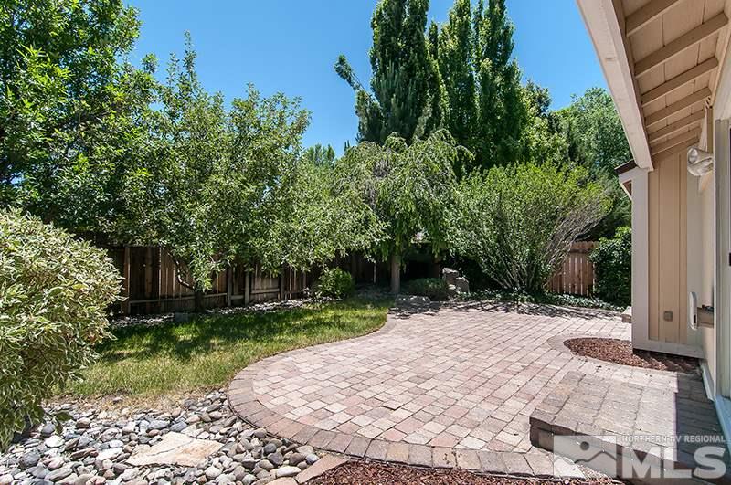 7716 Pickering Circle Reno, NV 89511 - Photo 14 of 15 front view of a house with a yard