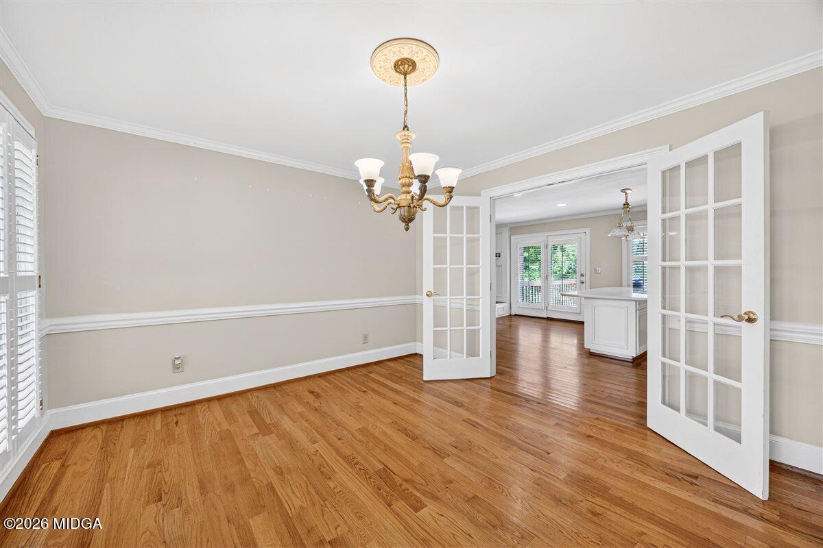 335 Hamrick Road Macon, GA 31220 - Photo 11 of 41 a view of livingroom with hardwood floor and kitchen