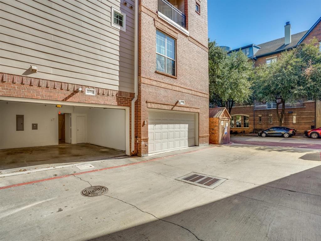 15711 Spectrum Drive, Unit 80 Addison, TX 75001 - Photo 26 of 26 a view of a street with a building