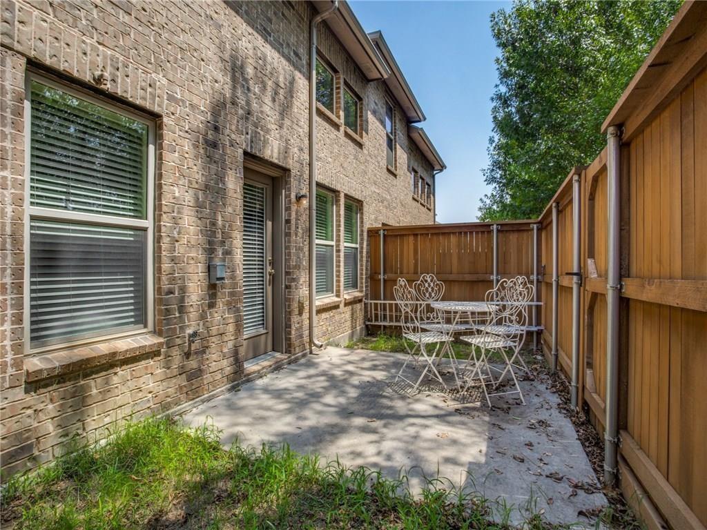 1163 Sophia Street Allen, TX 75013 - Photo 15 of 18 a view of chair and table in the patio