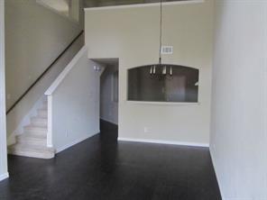 1163 Sophia Street Allen, TX 75013 - Photo 6 of 18 a view of a hallway with wooden floor