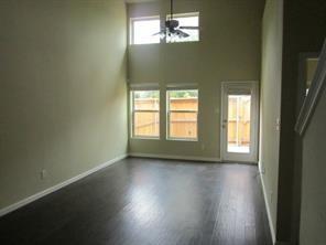 1163 Sophia Street Allen, TX 75013 - Photo 7 of 18 a view of empty room with wooden floor and fan