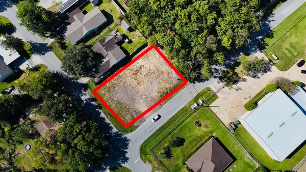 a view of a swimming pool and an outdoor space