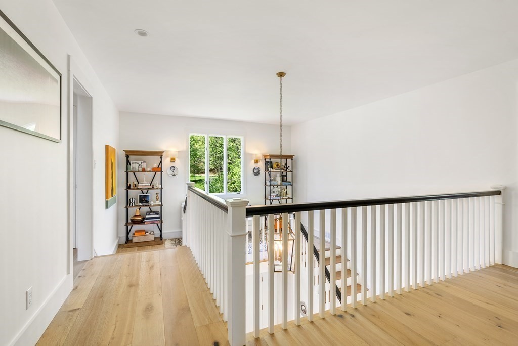 338 South Great Road Lincoln, MA 01773 - Photo 14 of 29 a view of hallway with wooden floor and stairs