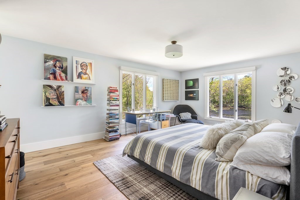 338 South Great Road Lincoln, MA 01773 - Photo 15 of 29 a bedroom with a large bed and a large window