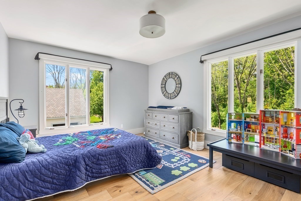 338 South Great Road Lincoln, MA 01773 - Photo 17 of 29 a bed room with a bed and a window