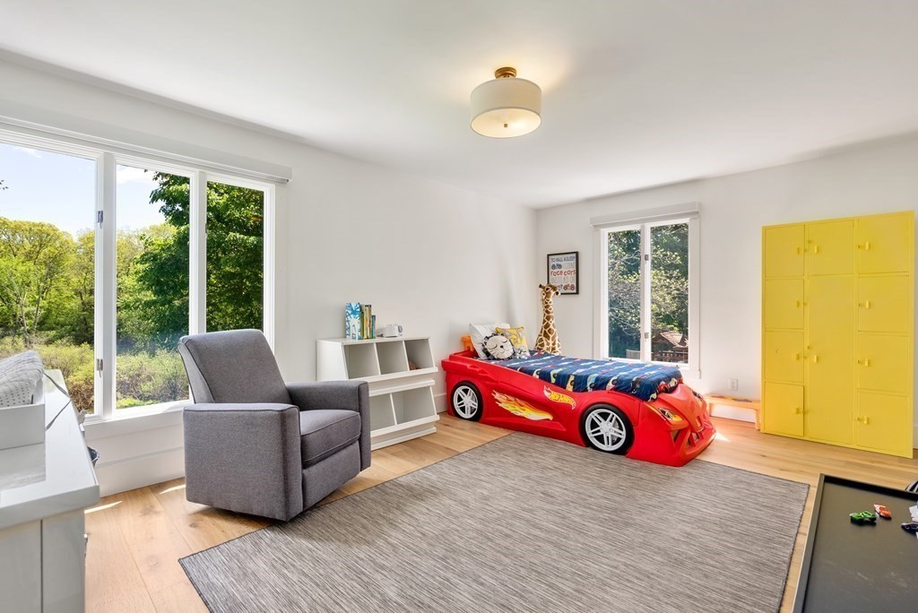 338 South Great Road Lincoln, MA 01773 - Photo 18 of 29 a living room with furniture and windows