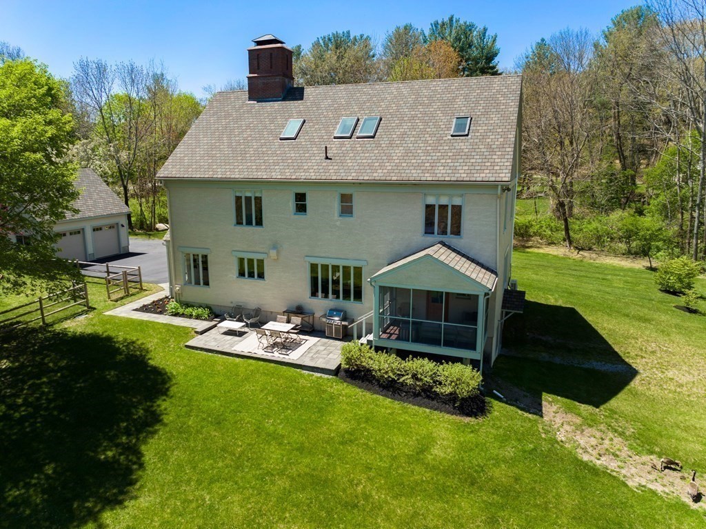 338 South Great Road Lincoln, MA 01773 - Photo 27 of 29 a aerial view of a house with garden