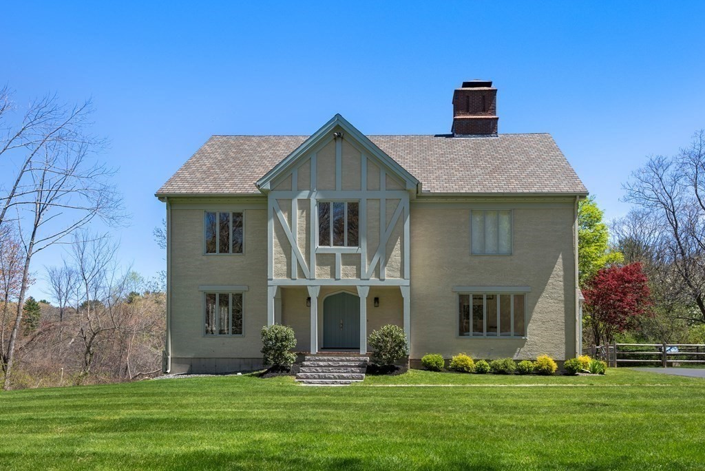 338 South Great Road Lincoln, MA 01773 - Photo 29 of 29 a front view of a house with a yard