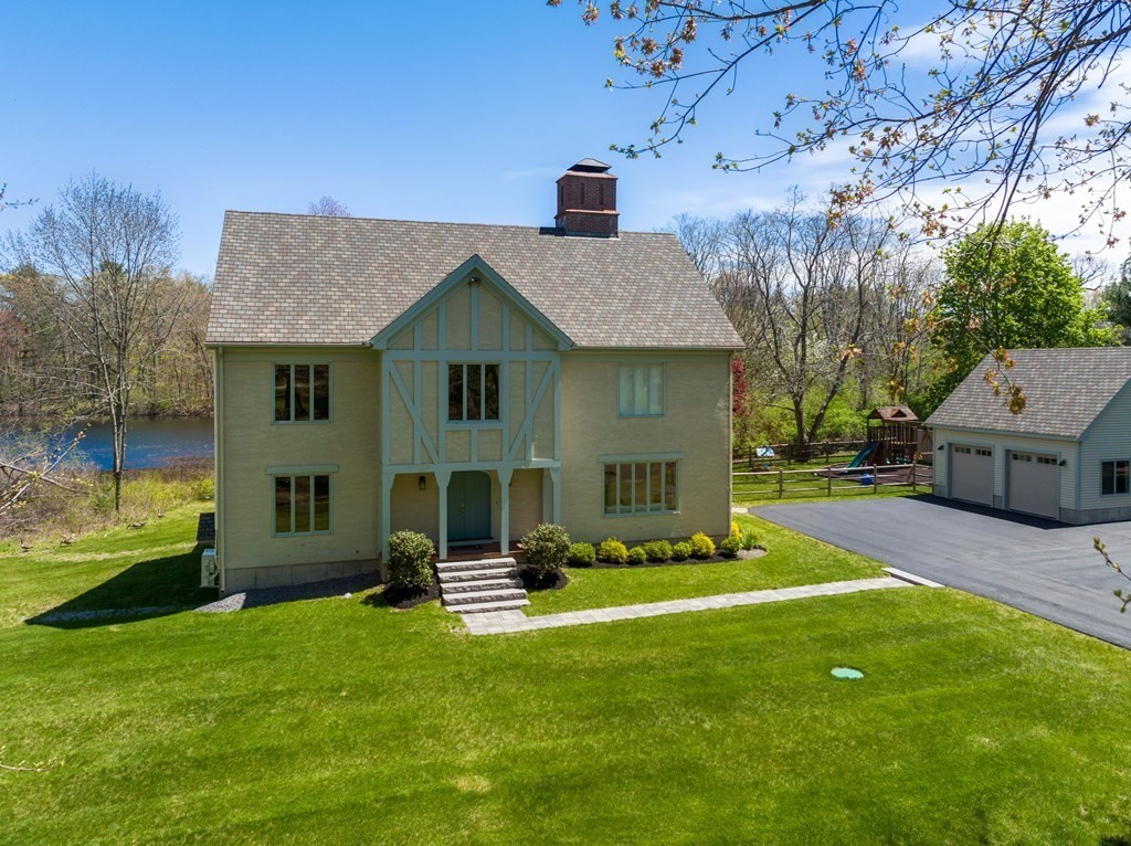 338 South Great Road Lincoln, MA 01773 - Photo 4 of 29 a house view with swimming pool and garden space