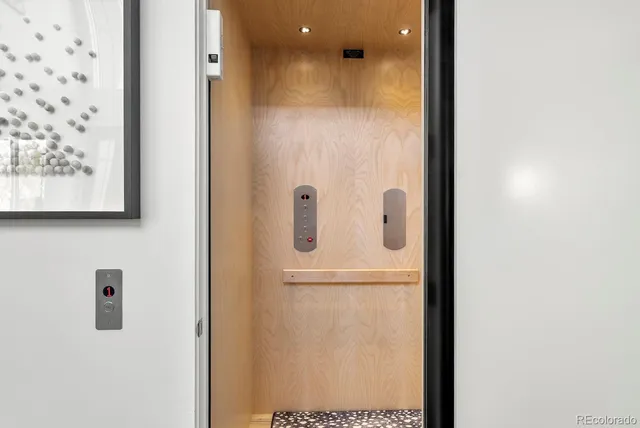a view of elevator with hallway