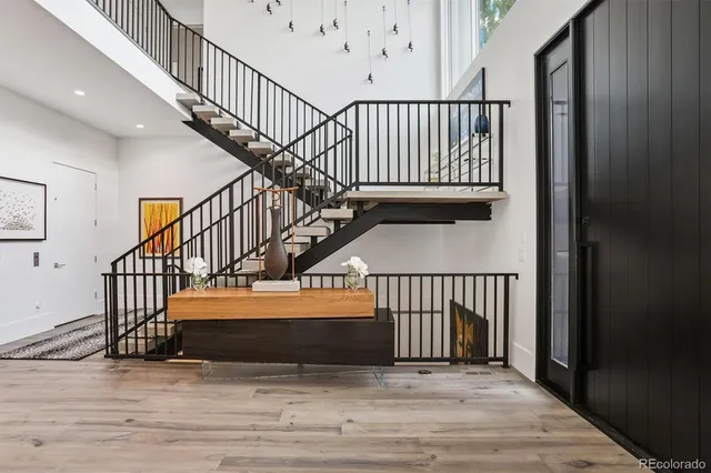 a view of entryway with wooden floor