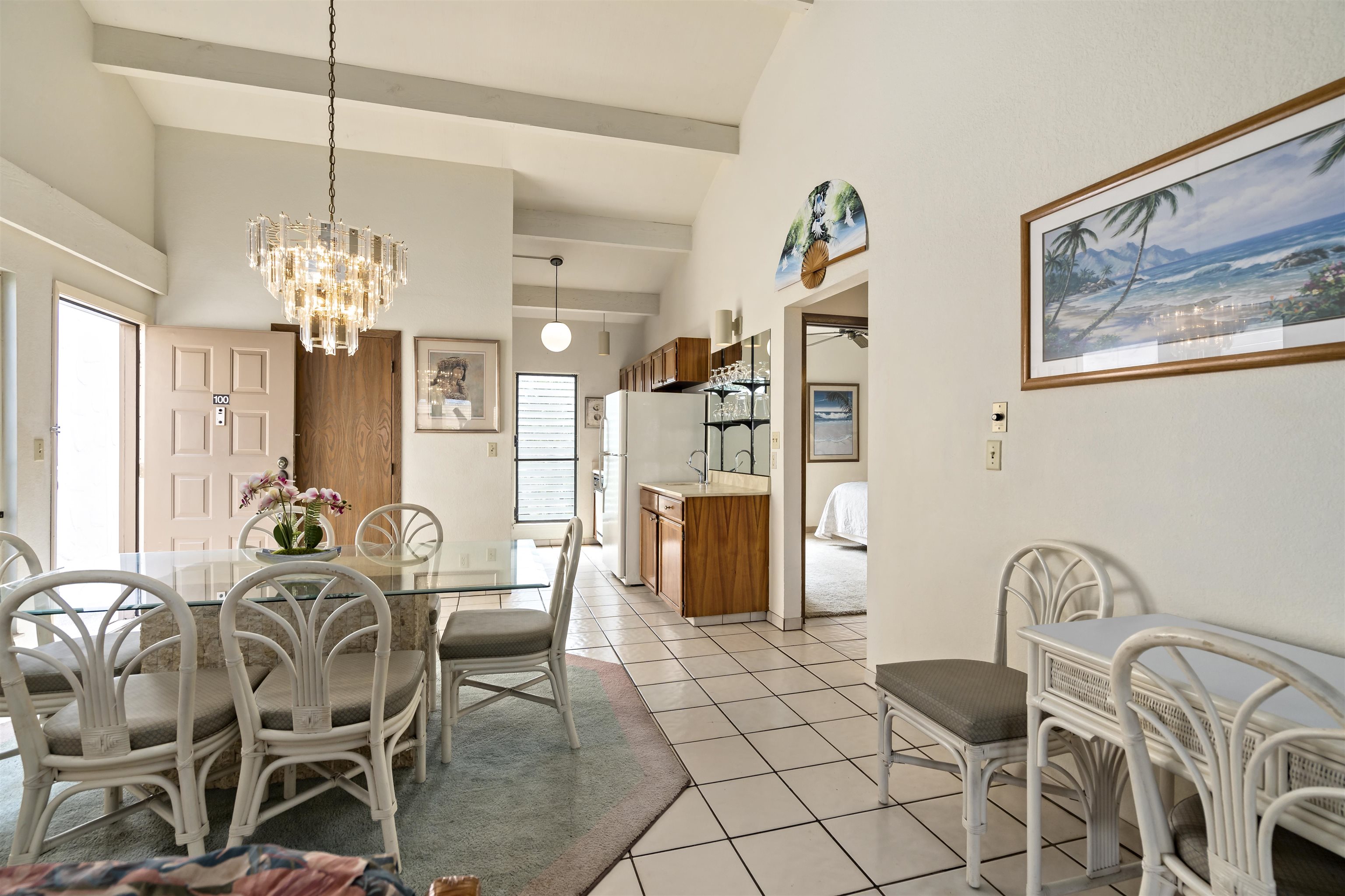 2881 South Kihei Road, Unit 100 Kihei, HI 96753 - Photo 18 of 32 a dining room with furniture and window