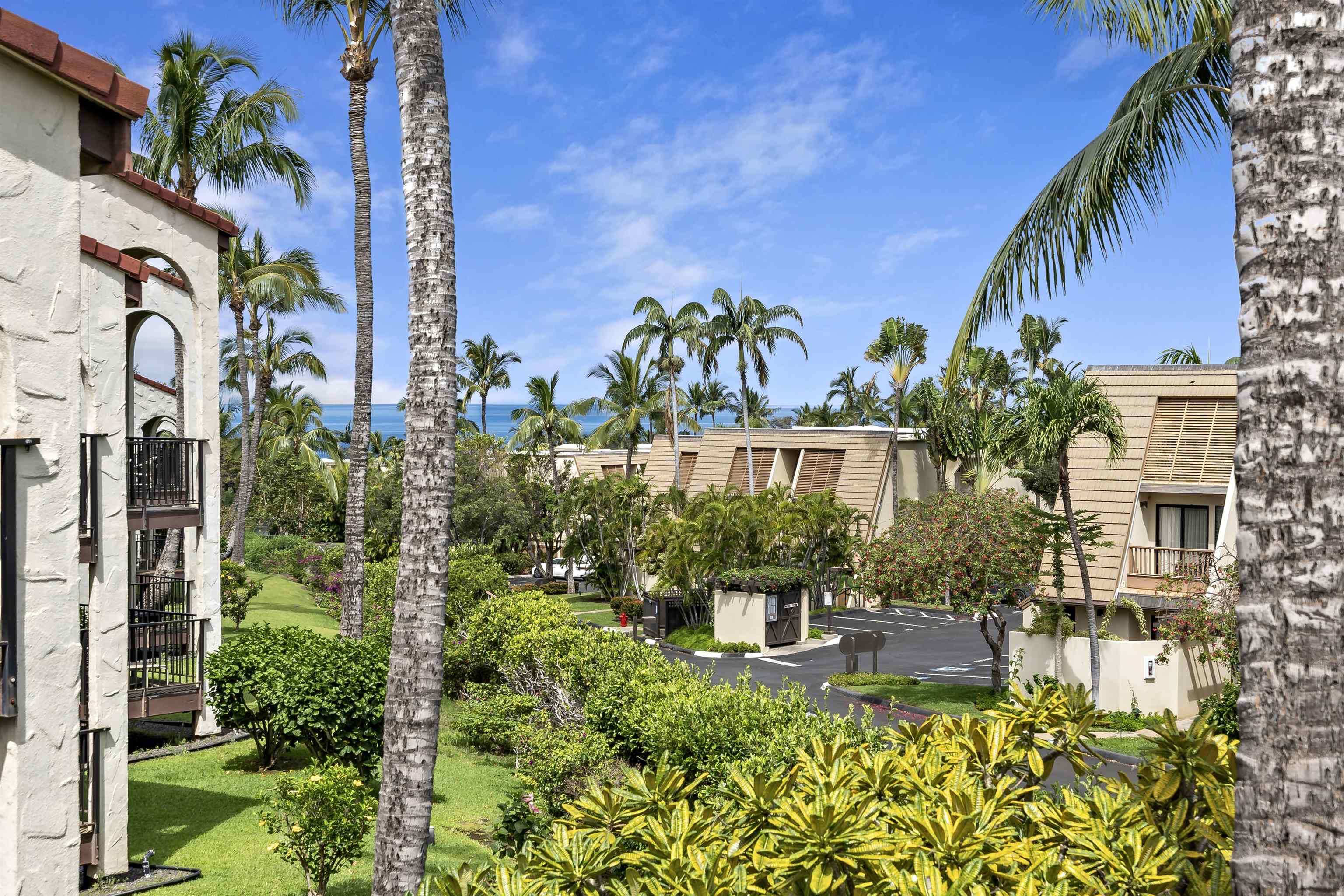2881 South Kihei Road, Unit 100 Kihei, HI 96753 - Photo 32 of 32 a front view of a house with a garden