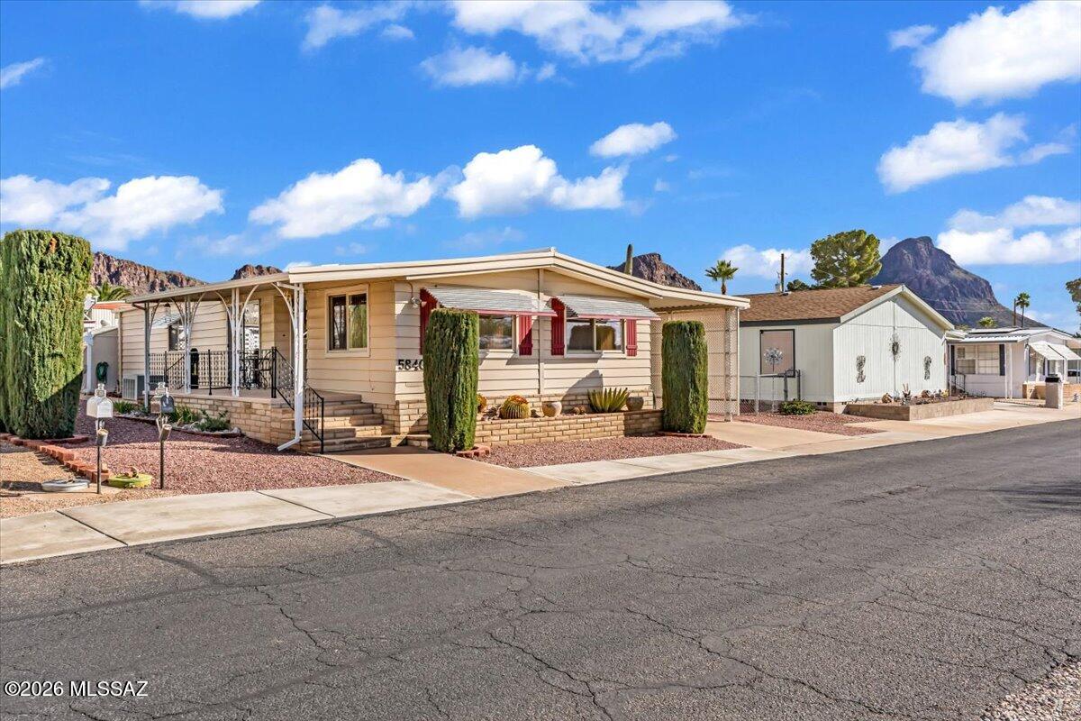 5840 West Flying W Street Tucson, AZ 85713 - Photo 1 of 38 a view of house with a outdoor space