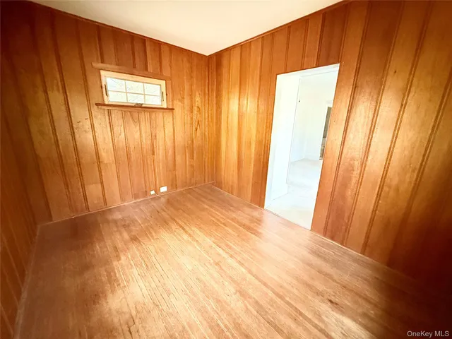 a view of a livingroom with wooden floor