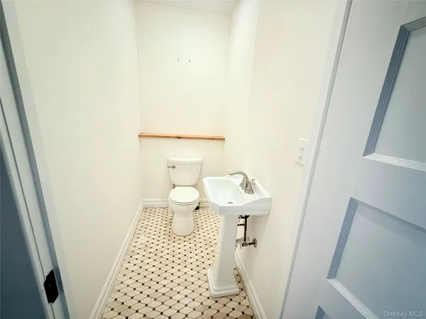 a bathroom with a sink and a toilet