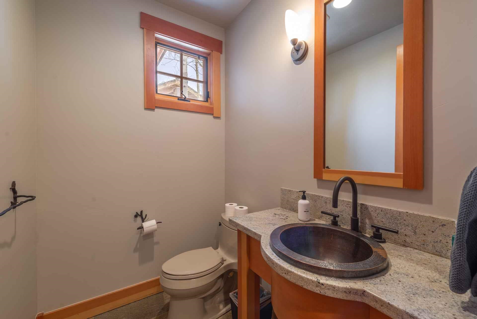 1723 Grouse Ridge Road Truckee, CA 96161 - Photo 17 of 21 a bathroom with a granite countertop toilet sink and mirror
