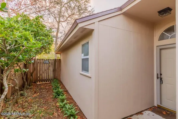 a house view with a backyard