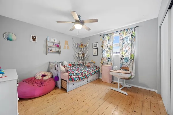 a room with toys and wooden floor