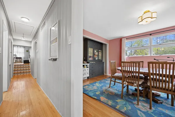 a large kitchen with stainless steel appliances granite countertop a refrigerator and a stove top oven