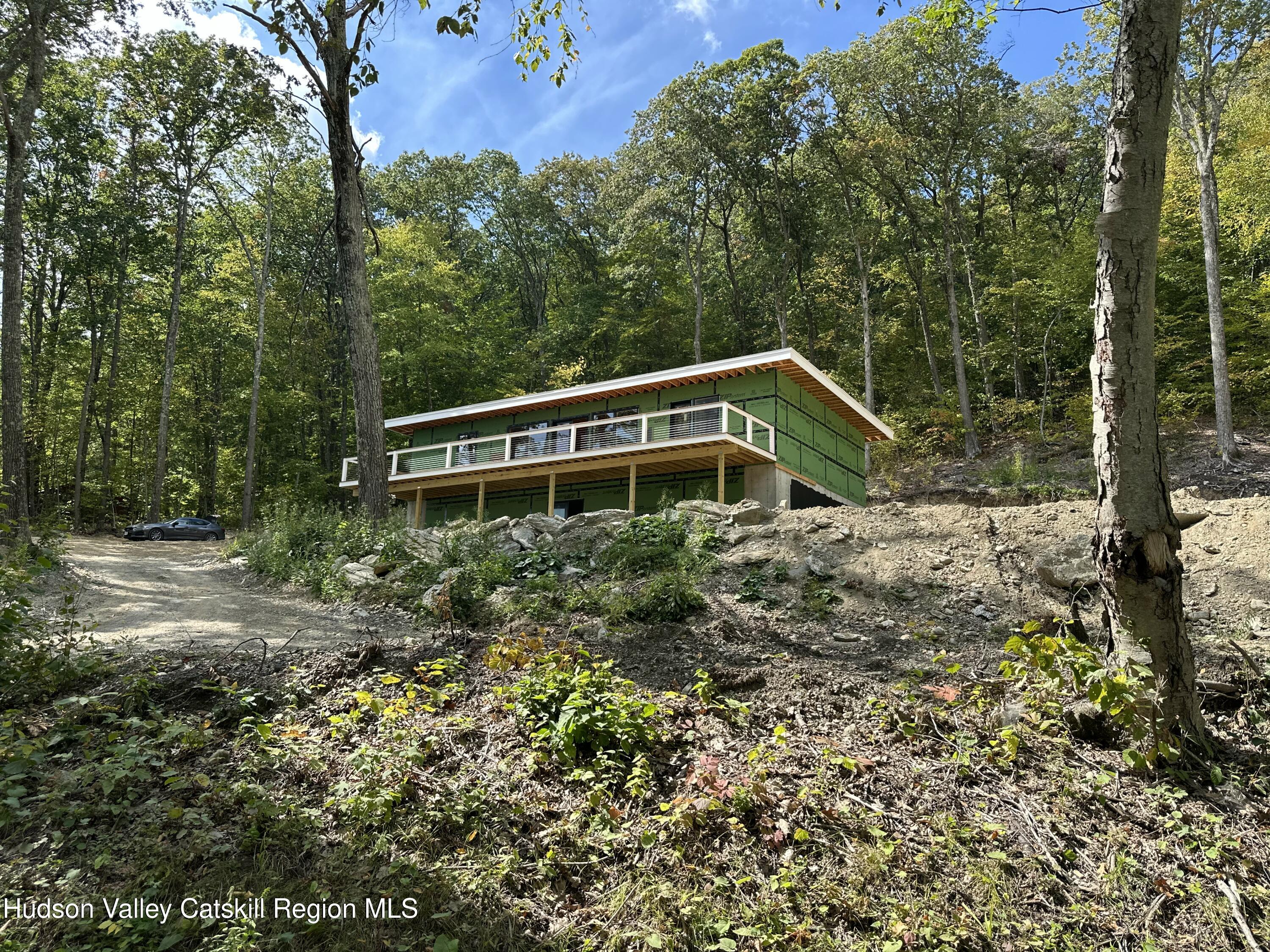 801 Rodman Road Hillsdale, NY 12529 - Photo 4 of 25 a house view with a garden space