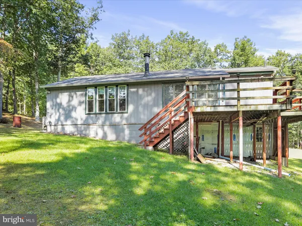 front view of a house with a big yard